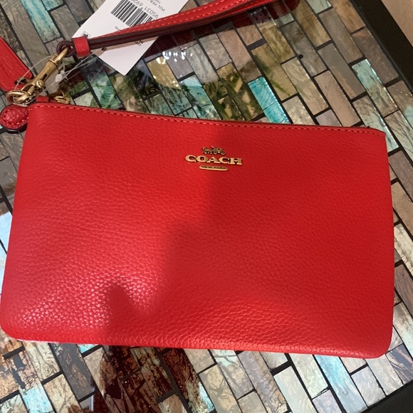 Coach Leather Wristlet
COACH - Picture 13 of 17